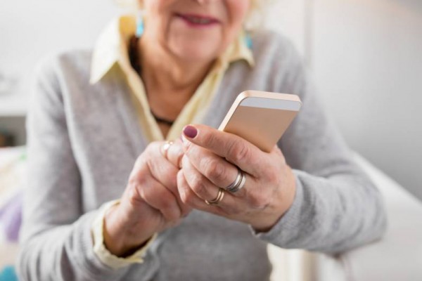 Old person using smartphone