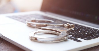Computer misuse, handcuffs