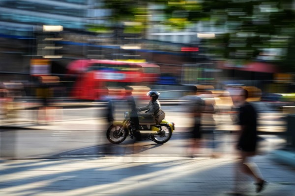 Blurred image of man on bycicle