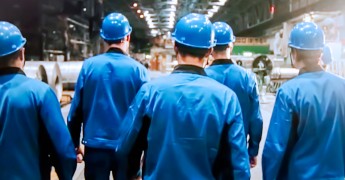 Blue collar workers in hard hats